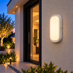 Ovale weiße LED Außenwandleuchte 18W am Hauseingang mit warmweiß leuchtender Front